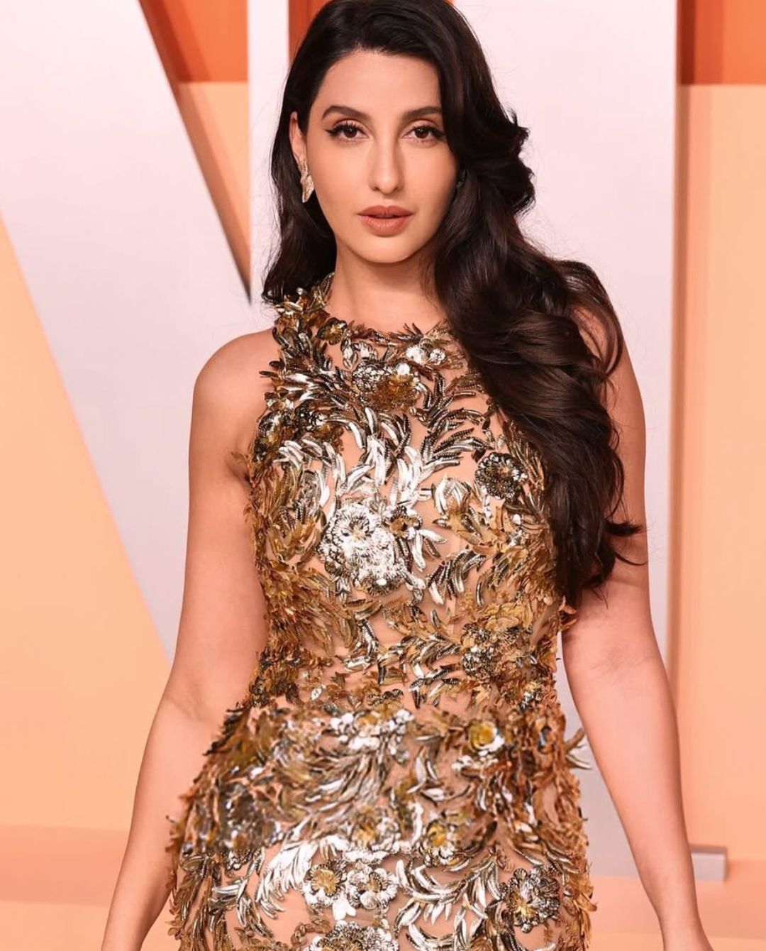 NoraFatehi : గోల్డ్ కలర్ డ్రెస్ లో మెరిసిపోతున్న నోరా.. చూడటానికి రెండు కళ్ళు చాలవు..