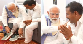 Modi meets Rampal: అభిమాని కాళ్లకు బూట్లు తొడిగిన ప్రధాని మోదీ..