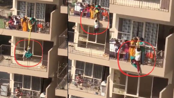 Mother Endangers Son: షాకింగ్ వీడియో.. చీర కోసం కొడుకును 4వ అంతస్తు నుంచి వేలాడదీసిన తల్లి!