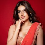 Nidhi Agarwal : ఆరేంజ్ కలర్ శారీలో మెరిసిపోతున్న నిధి.. రెండు కళ్లు చాలట్లేదు..